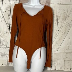 🛍️SOLD 🛍️ Rust boutique Body Suit